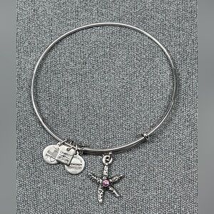 Alex and Ani silver tone bangle bracelet with starfish charm.